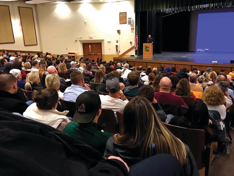 Students listening Herren's story